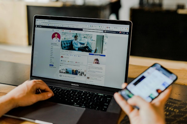 Facebook profile open on laptop Facebook profile open on laptop