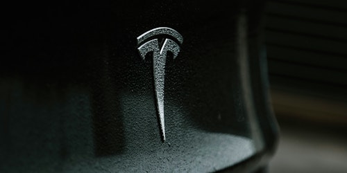 Tesla logo on one of its cars Tesla logo on one of its cars