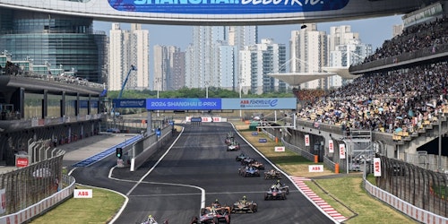 Formula E cars on the track in Singapore Formula E cars on the track in Singapore