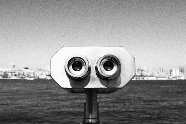 A black-and-white photograph of a binocular-style viewfinder A black-and-white photograph of a binocular-style viewfinder