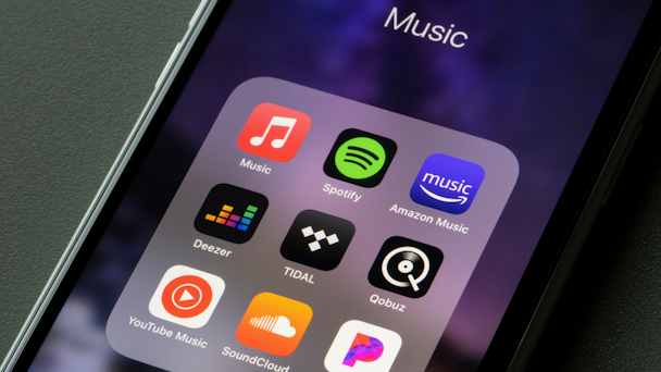 Music apps on mobile phone screen Music apps on mobile phone screen