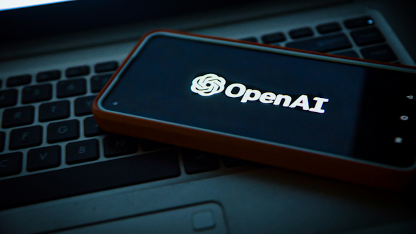 OpenAI logo on mobile screen OpenAI logo on mobile screen