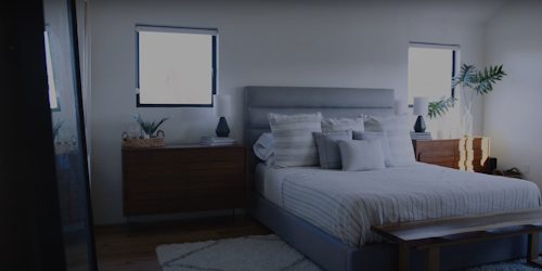 A bedroom in a house being dressed for viewing by homebuyers A bedroom in a house being dressed for viewing by homebuyers