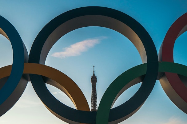 The Eiffel Tower is visible through one of the Olympic rings The Eiffel Tower is visible through one of the Olympic rings