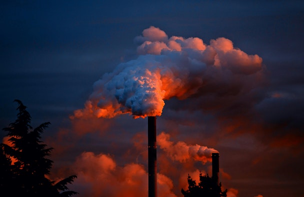 Steam coming out of a factory Steam coming out of a factory