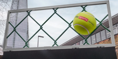 Giant tennis balls on a billboard Giant tennis balls on a billboard