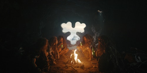 Cave people with Carlsberg bottles Cave people with Carlsberg bottles