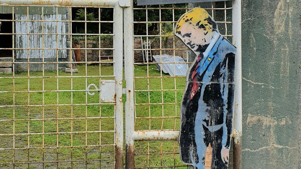 Artwork of Trump on a fence Artwork of Trump on a fence