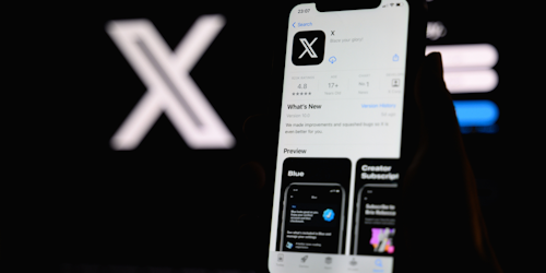X app on mobile phone display X app on mobile phone display