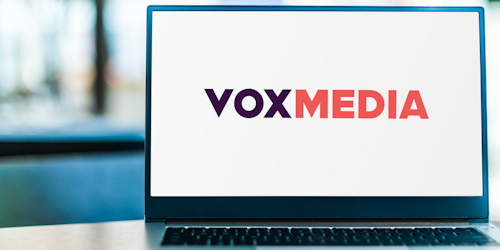 Vox Media logo on laptop screen Vox Media logo on laptop screen
